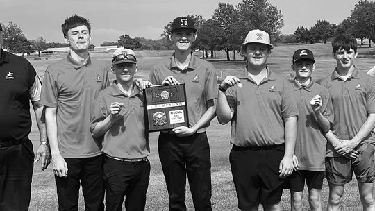 Erie hosts, wins 2A regional golf crown