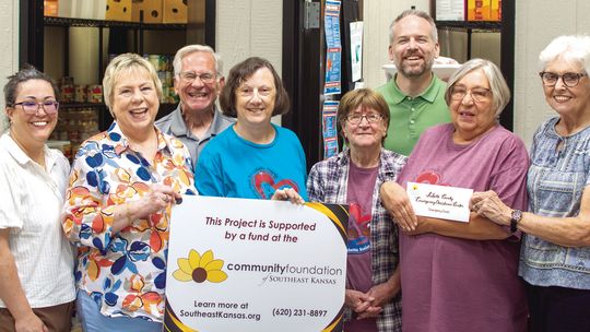 SEK COMMUNITY FOUNDATION DELIVERS CHECK