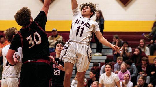 St. Paul survives Erie comeback bid