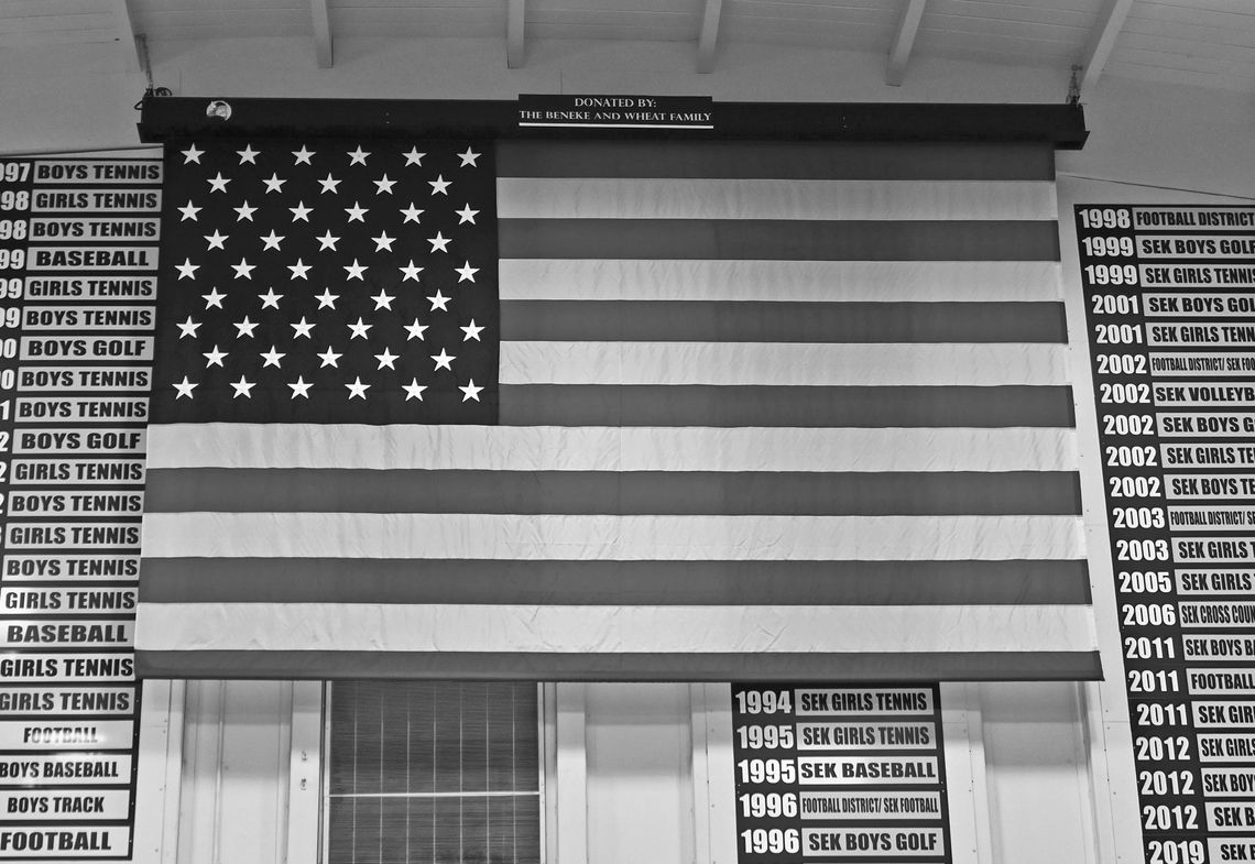 Beneke and Wheat family donates flag for PHS gymnasium