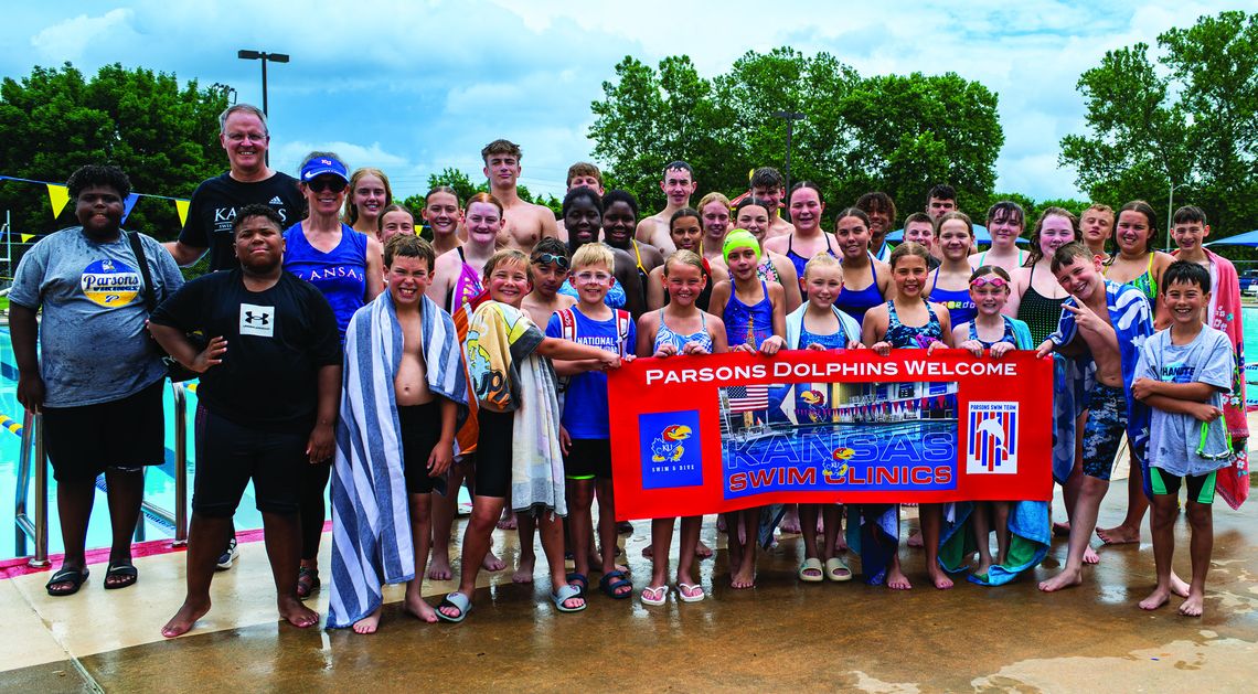 Dolphins bring in KU coach for swimming clinic